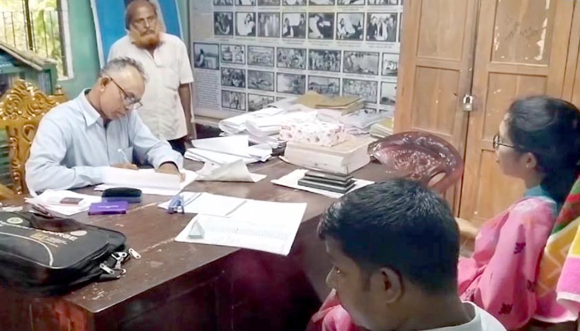Question papers and notebooks were recovered from the students house